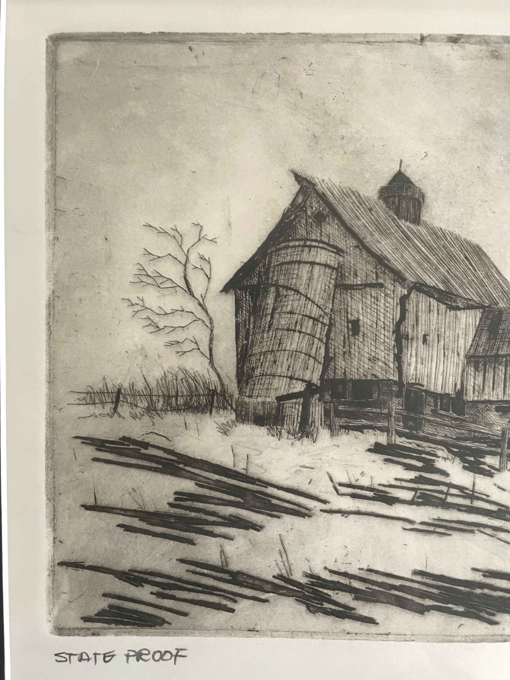 A black and white original print of a rustic barn and silo with a bare tree,  with a white border and the text 'STATE PROOF' at the bottom.